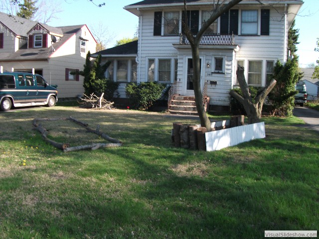 So, I decided I'd best start my farm right at home - 385 Titus Ave. This shot was taken mid-April when I already had two mulch beds set up in the front yard.